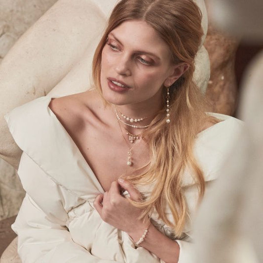 ORECCHINO ONDA BIANCA PENDENTE