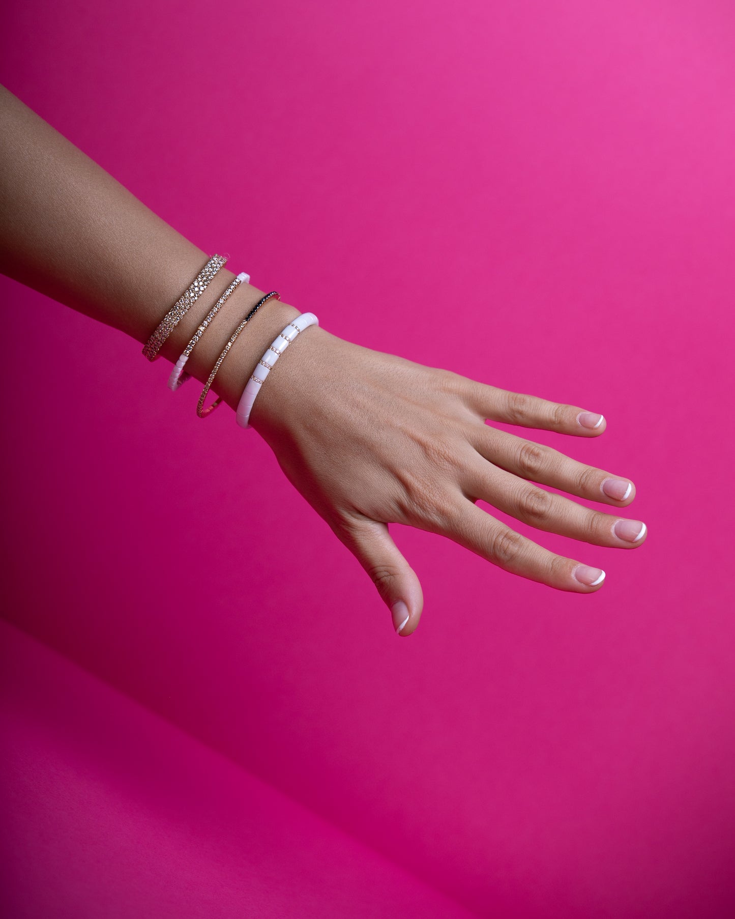 BRACCIALE TENNIS EXTENSIBLE DIAMANTI BROWN E NERI - Tangredi Gioielleria