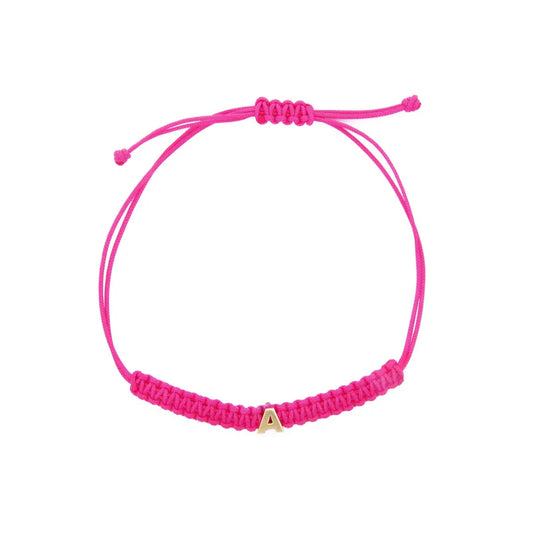 BRACCIALE TESSUTO FUCSIA CON LETTERA ORO - Tangredi Gioielleria