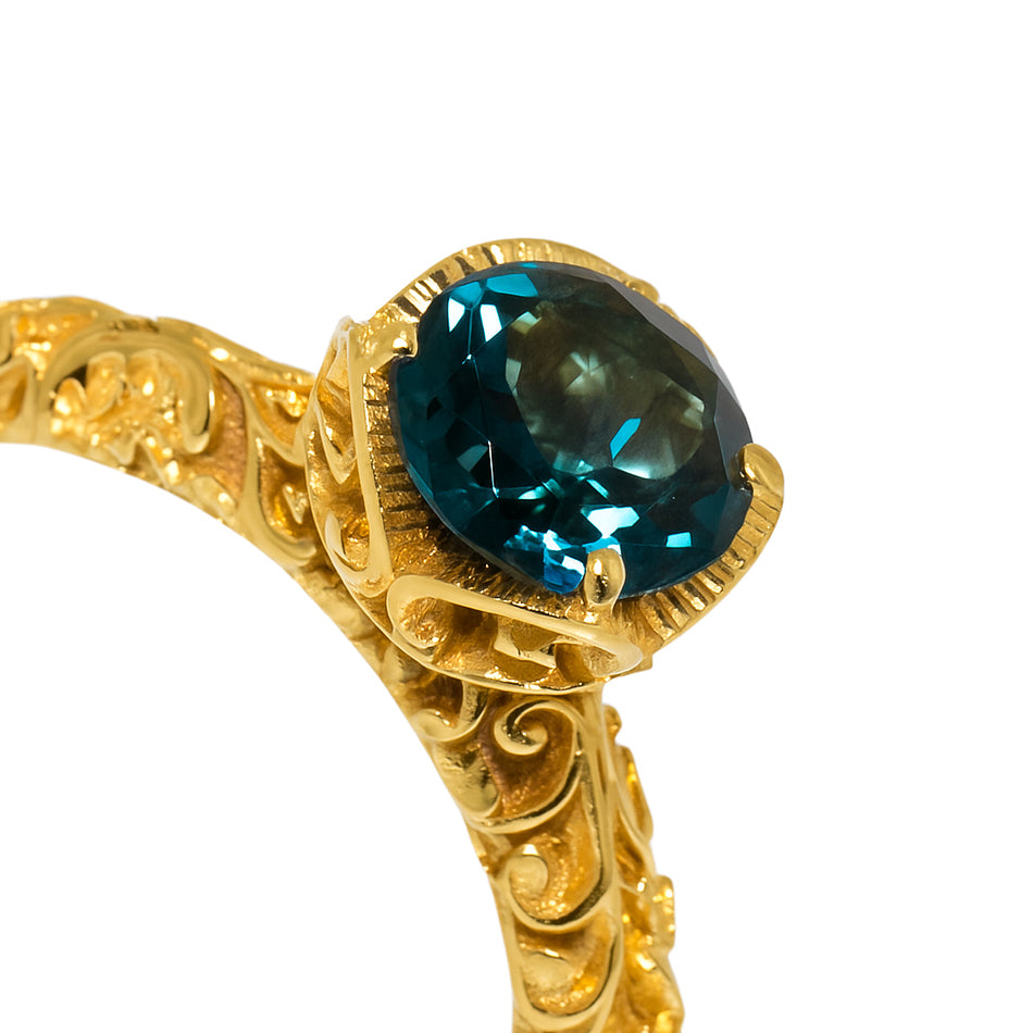 ANELLO COCKTAIL DORATO CON TOPAZIO BLUE LONDON - Tangredi Gioielleria