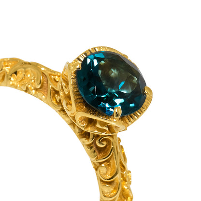 ANELLO COCKTAIL DORATO CON TOPAZIO BLUE LONDON - Tangredi Gioielleria